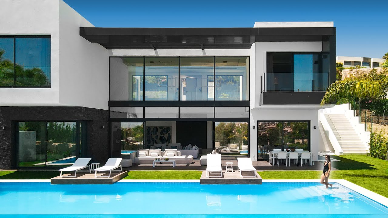 €3.300.000 Brand New Modern Villa with Golf and Sea Views in Marbella | Drumelia Real Estate
