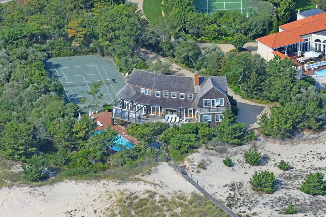 image  1 Down prestigious Meadow Lane, stands this iconic oceanfront beach house known as Whitecaps