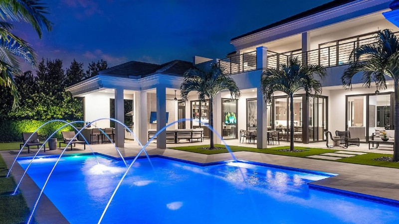 This $15000000 Royal Palm House In Boca Raton Offers A Slice Of Paradise With An Amazing Backyard