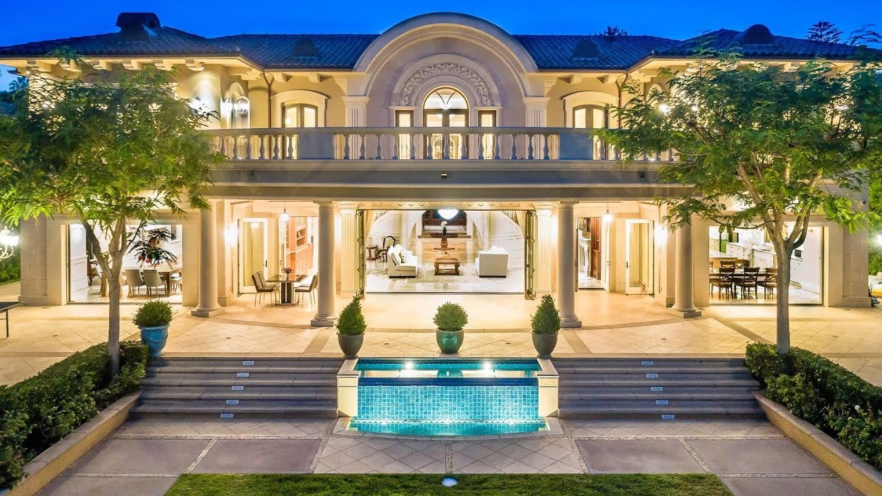 This $16995000 Custom Palatial Estate In Brentwood Has A Dramatic Dual Staircase