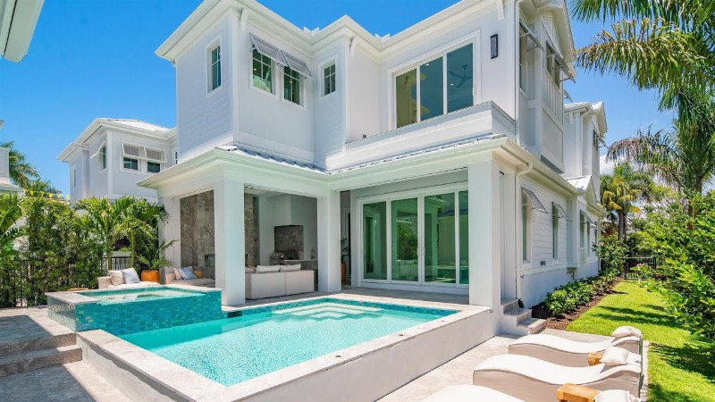 Two Story Coastal Styled Home With Generous Outdoor Living Space In Naples For Sale At $5.35 Million